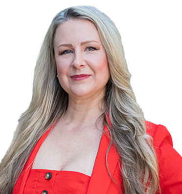 Chantelle Duquenoy Garrett smiles in a red blazer and dress.
