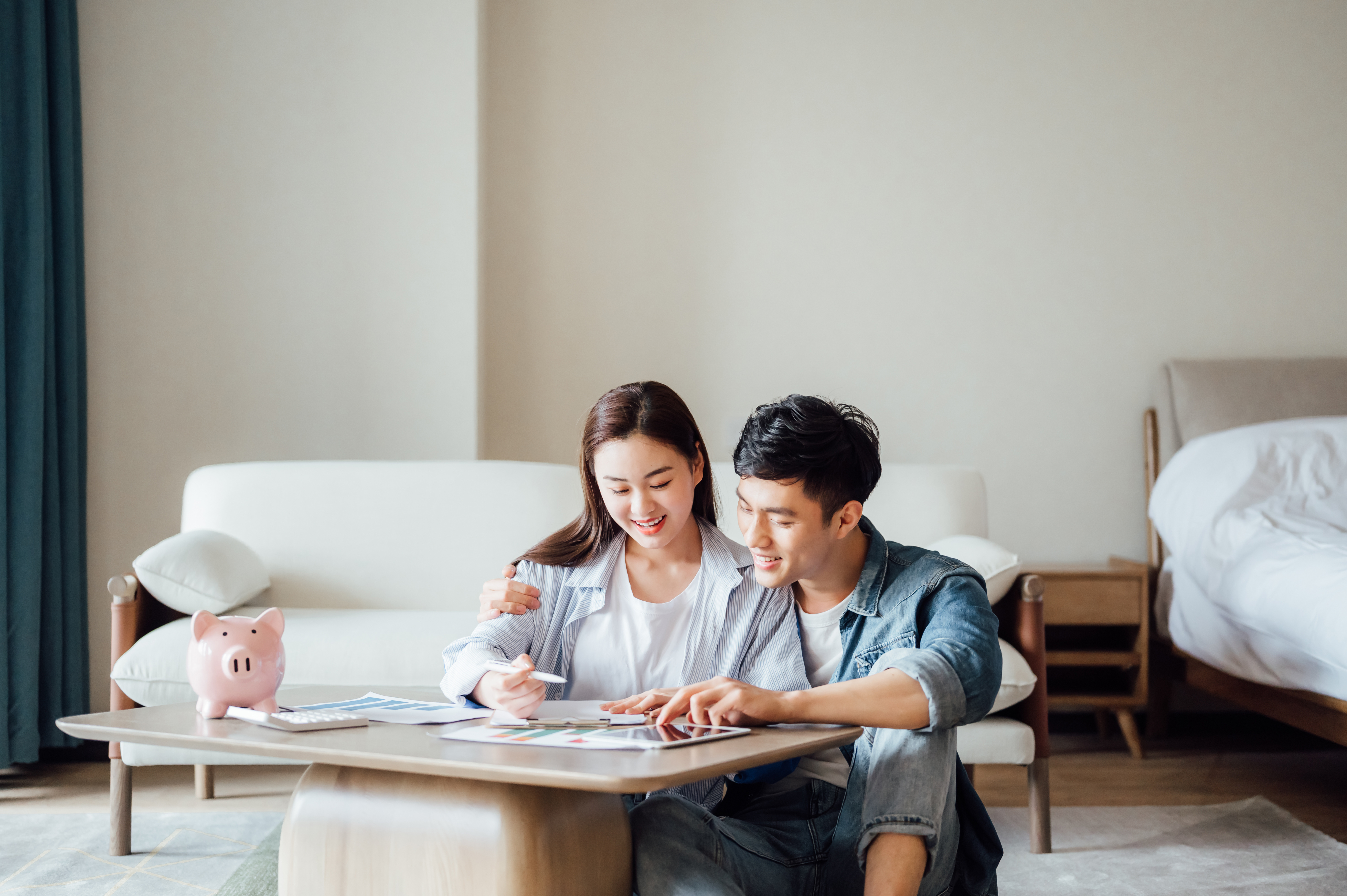 refinancing a HELOC - couple reviewing their finances