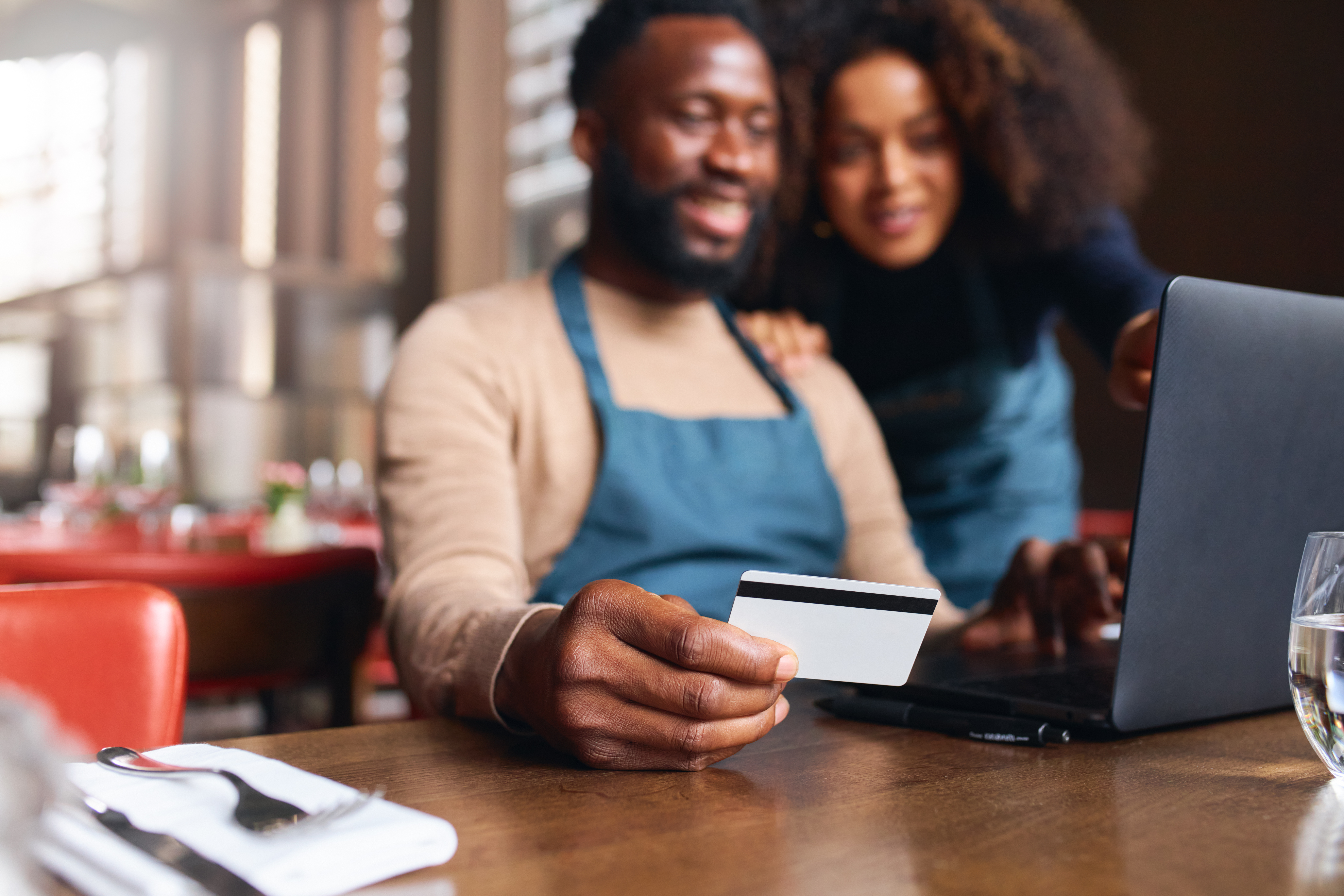 Business Partners reviewing their Business Checking account