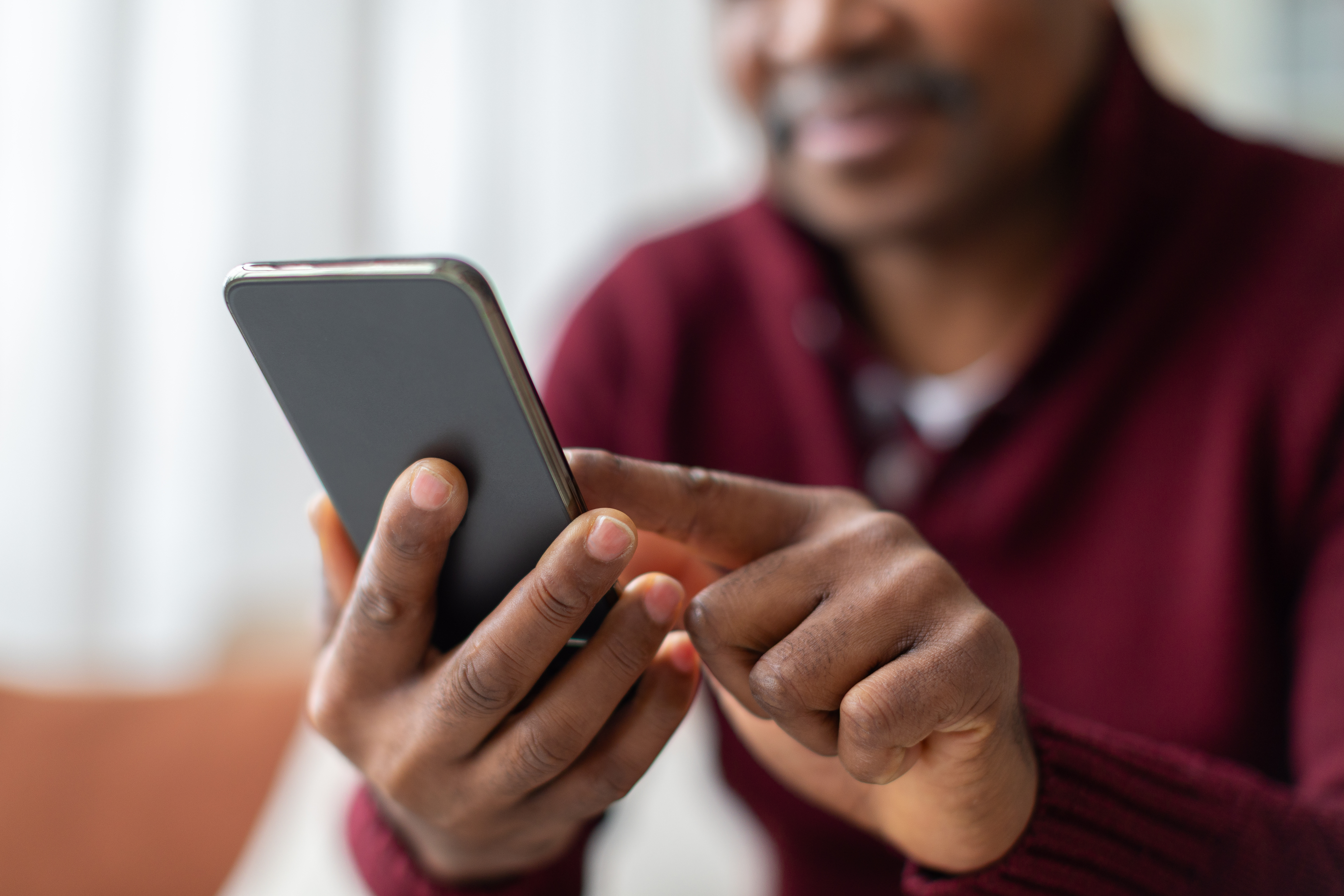 Client using our digital banking app to access his HELOC funds