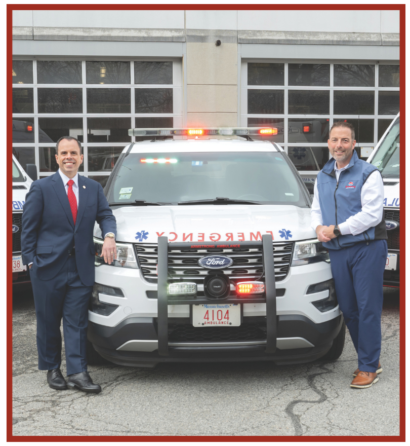 Leader Bank Senior Vice President and Chief Lending Officer Matthew Pierce (bottom center), Armstrong Ambulance CEO Richard Raymond (bottom right), and Armstrong Ambulance Director of Operations Sean Mangan (bottom left) at the businessâs Arlington, MA headquarters.