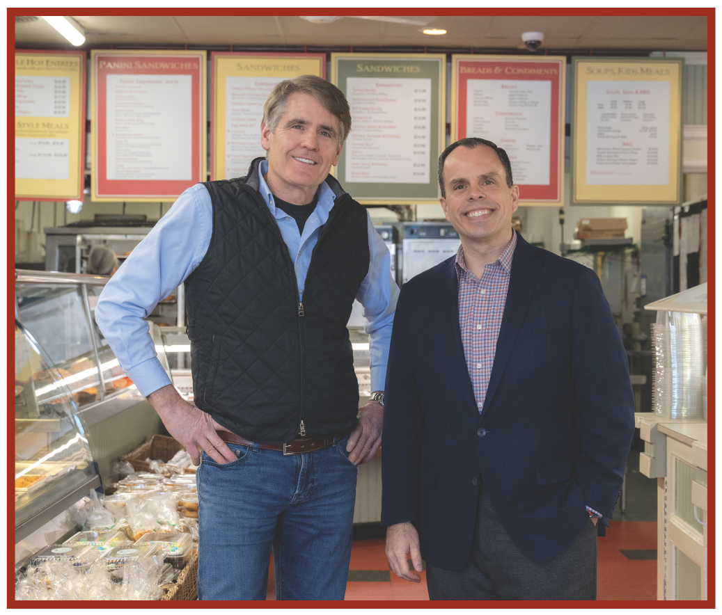 Neillio's Gourmet Kitchen & Catering Founder Kevin O'Neil (right), and Leader Bank Senior Vice President and Chief Lending Officer Matthew Pierce (right) at Neillio's Lexington, MA headquarters.