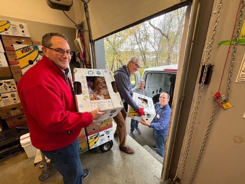 Leader Bank Team Members Participating in a Food Link Food Drive
