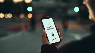 Lanlord receiving an rent via online rent collection.