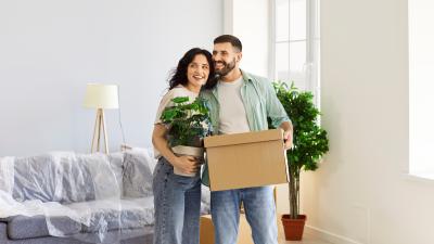 Couple moving into their new home using a Masshousing Loan