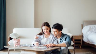 refinancing a HELOC - couple reviewing their finances