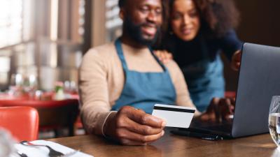 Business Partners reviewing their Business Checking account