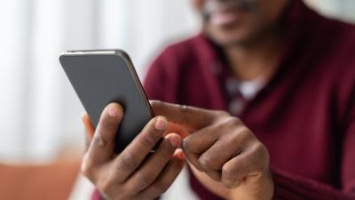 Client using our digital banking app to access his HELOC funds