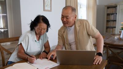 Retired couple evaluating if a HELOC or reverse mortgage is better for them