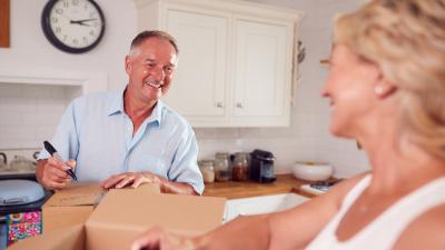 Couple discussing if they should renovate their home with a heloc or downsize